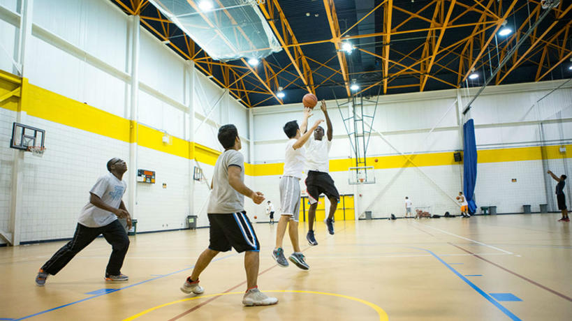 Students playing basketball in the Fieldhouse