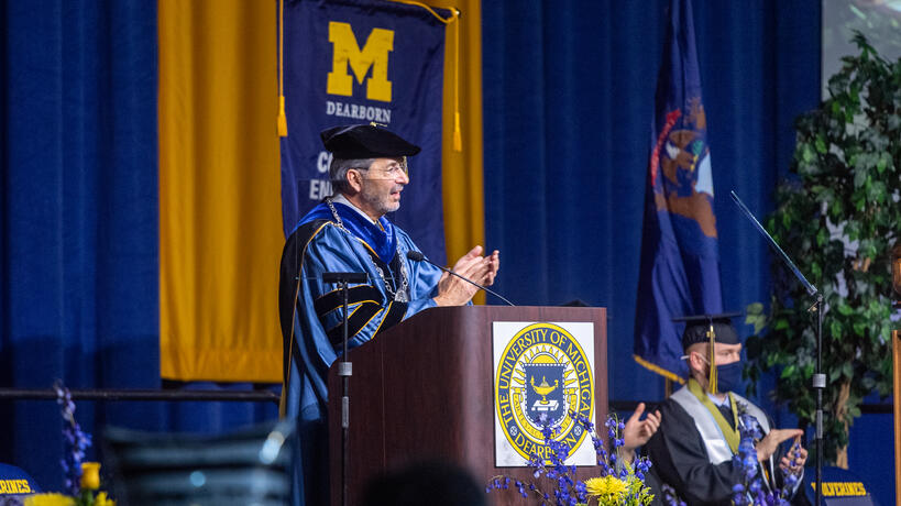 Chancellor Grasso speaking at a commencement ceremony