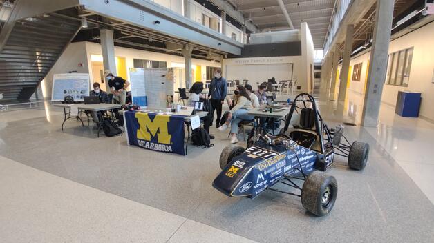 Students working on the Formula SAE car in the IAVS, Photo by Rudra Mehta